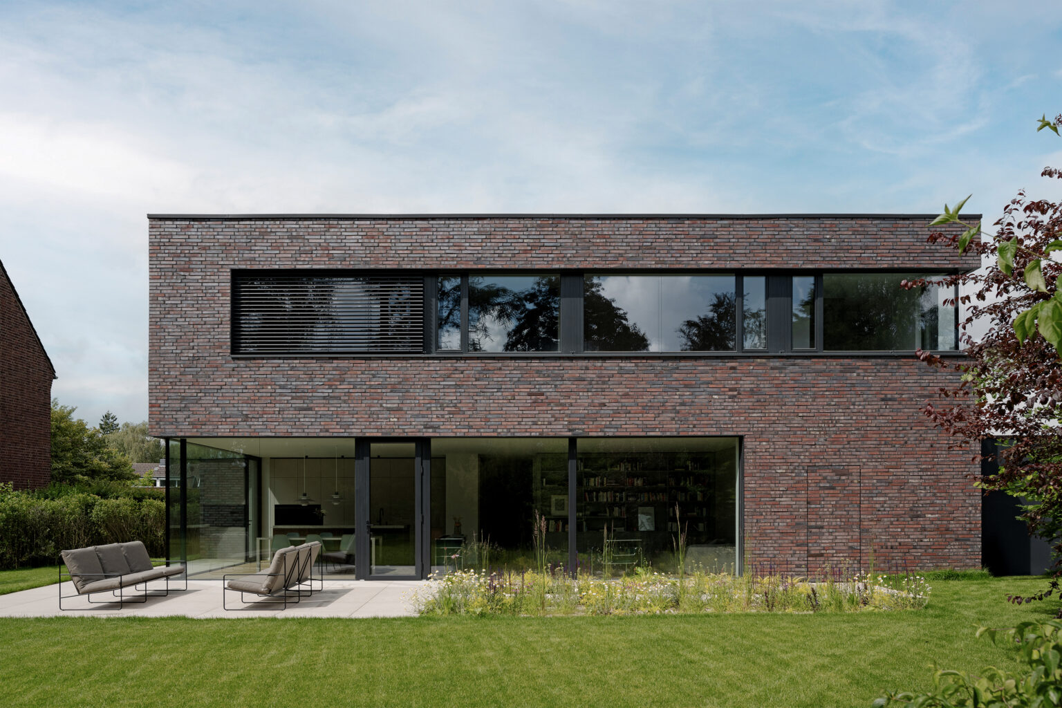Zeitlose Architektur mit charakterstarker Klinkerfassade – Bild 8 von 10
