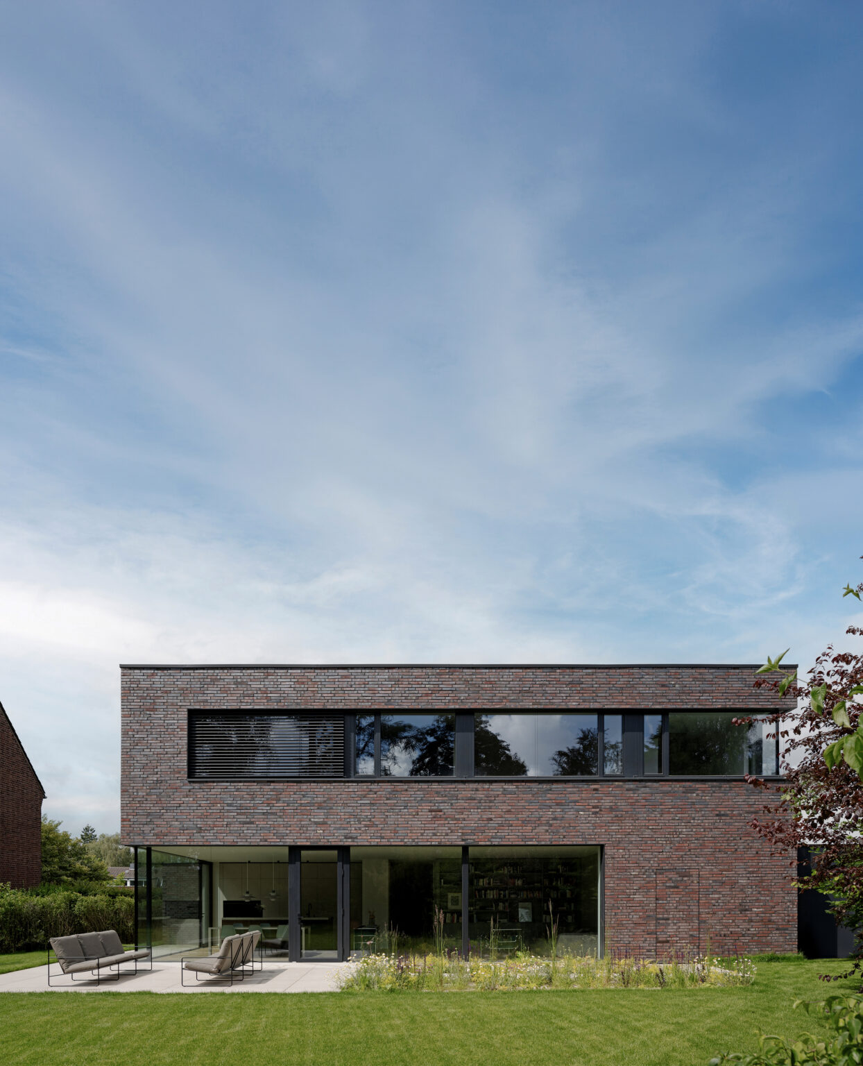 Zeitlose Architektur mit charakterstarker Klinkerfassade – Bild 7 von 10
